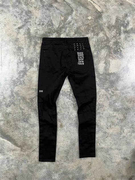 Fitted at the waist, slim through the hip and thigh and a narrower leg opening. . Black ksubi jeans